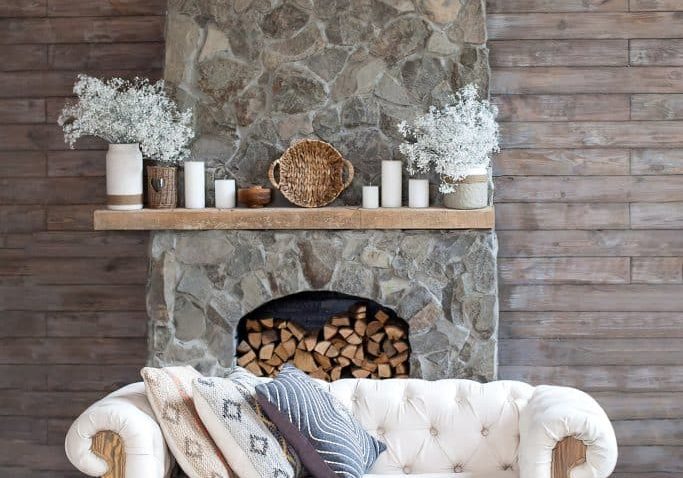 cosy-living-room-with-eco-decor-wood-nature-concept-interior-room-scandinavian-interior-hygge-decoration-cozy-stone-fireplace-with-white-sofa-wooden-wall-boho-rustic-interior cosy-living-room-with-eco-decor-wood-nature-concept-interior-room-scandinavian-interior-hygge-decoration-cozy-stone-fireplace-with-white-sofa-wooden-wall-boho-rustic-interior